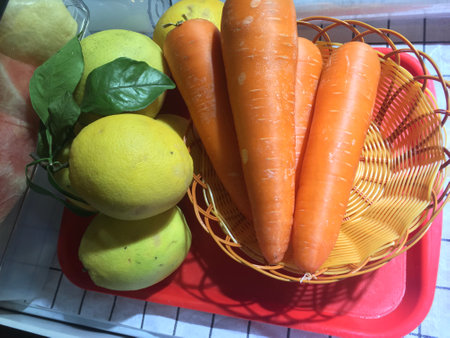 Fresh Carrots and Lemons in Basket as Stock Image as JPG Fileの写真素材
