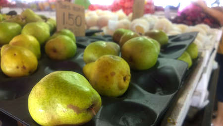 Green Pears in the marketの写真素材