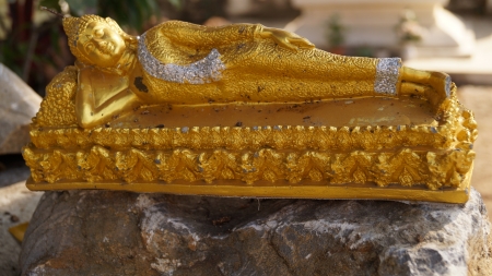 Golden reclining buddhaの写真素材