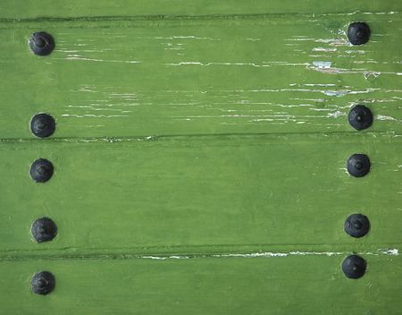 old wooden riveted wallの写真素材