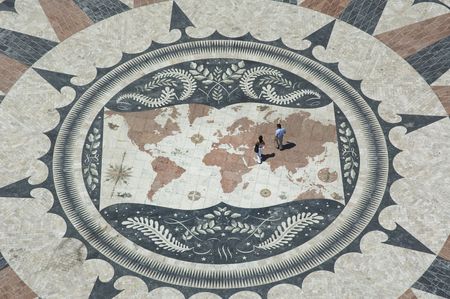 couple on world map, belem, lisbon, portugalの写真素材