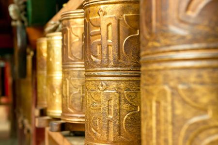 tibetan prayer wheels in songzanlin tibetan monastery, shangri-la, china