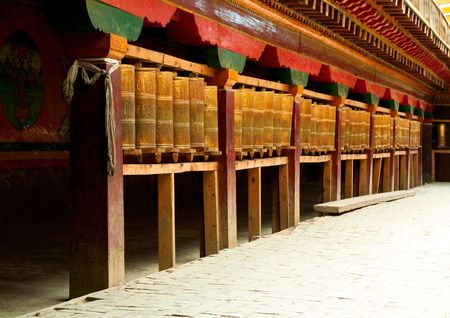 tibetan prayer wheels in songzanlin tibetan monastery, shangri-la, chinaの写真素材