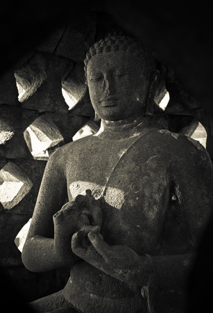 Buddha statue at Borobudur temple, Java, Indonesiaの写真素材