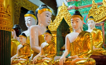 Buddha statues at Shwedagon Pagoda, Yangon, Myanmarの写真素材