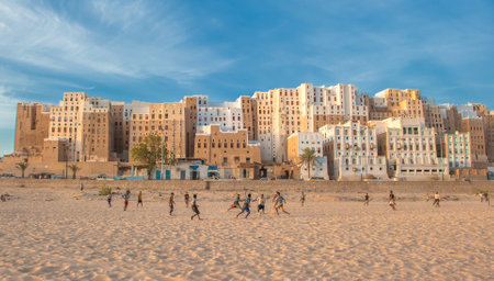 SHIBAM, YEMEN - February, 21: Yemeni boys playing soccer at Shibam, Hadramaut provence, Yemen on February, 21, 2011のeditorial素材