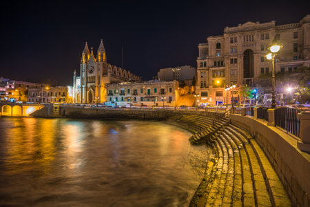 Church of Our Lady of Mount Carmel and Balluta Bay, Malta.のeditorial素材