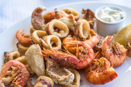 Mixed deep-fried fish, shrimp and squid platterの写真素材