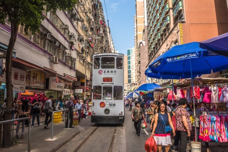 HONG KONG - April, 29, 2018: Double-decker tram in Chun Yeung Street Market, Hong Kong.のeditorial素材