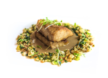Delicious fish dish at gourmet restaurantの写真素材