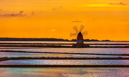 Marsala salt pans at sunset, Sicily, Italyの写真素材