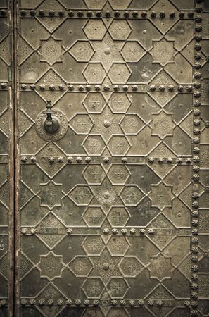 Old metal doors in traditional Moroccan style.の写真素材