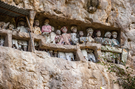 Tau tau, wooden statues representing dead men at burial cave, Tana Toraja, South Sulawesi, Indonesiaのeditorial素材