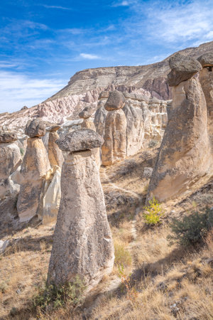 Fairy chimneys, unique rock formations near Cavusin Town in Cappadocia, Turkey.の写真素材