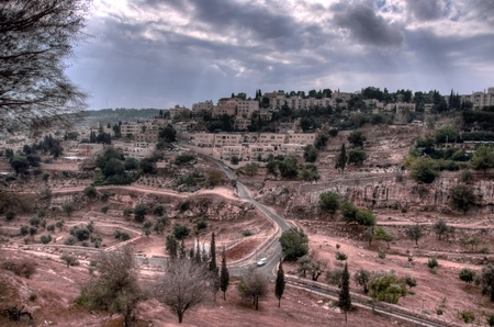 old hotels in jerusalem with dramatic sky in city of peace and warのeditorial素材