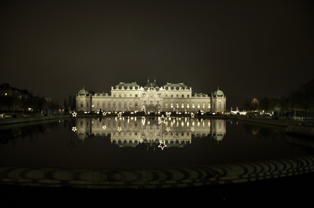 Nigth view to Belvedere palace in autumn Vienna tourismのeditorial素材