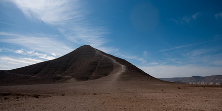 Stone desert tourism hiking in mountains under blue skyの写真素材