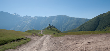Kazbek mountain and Trinity church in Georgia adventure travel
