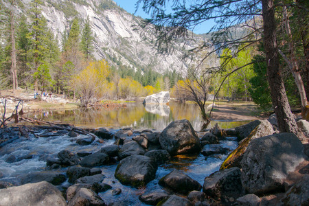 Hiking near water in Yosemite National parkの写真素材