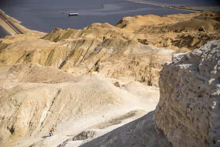 Hiking in stone desert near dead sea of Israel