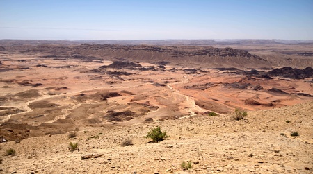 Hiking in stone desert mountain landscape of Israelの写真素材