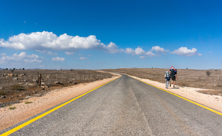 Middle east golan heights landscape with hiking bagpackersの写真素材