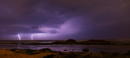 Lightning, heavy clouds and rain stormy weather