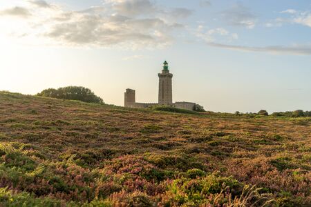 Romantic sunset in France sea coast travel attraction lighthouse