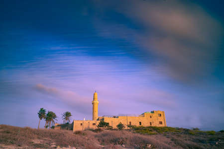Dramatic sunset view on mosque holy place