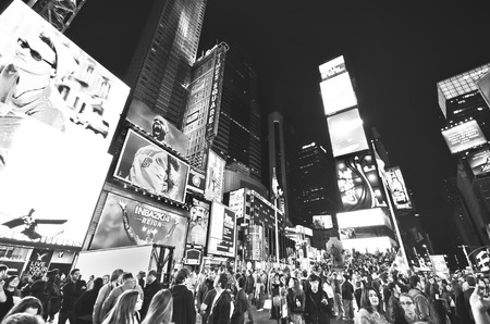 New York City, USA - October 11, 2013: View of Times Square with lots of visitors at night in New York City on October 11, 2013.のeditorial素材