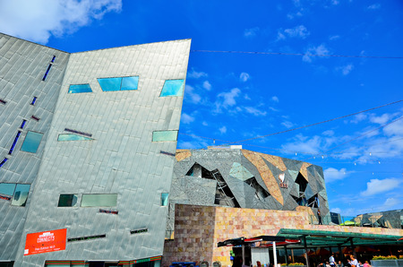 Melbourne, Australia - January 18, 2015: People visit Federation Square in Melbourne city cetre on January 18, 2015. The square is a public space created in 2002 in the heart of Melbourne.のeditorial素材