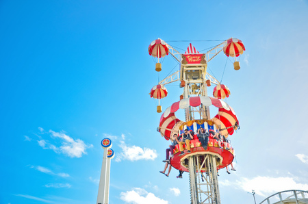 Melbourne, Australia - January 18, 2015: People playing at Luna Park amusement park where is located at St Kilda Beach in Melbourne on January 18, 2015.のeditorial素材