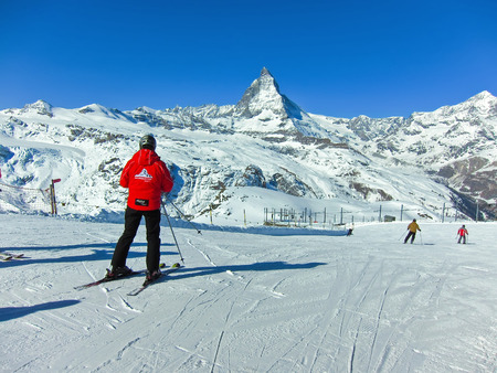 Zermatt, Switzerland - March 22, 2011: View of Matterhorn with some skiers preparing to ski from Gornergrat, Zermatt, Switzerland on March 22, 2011.のeditorial素材