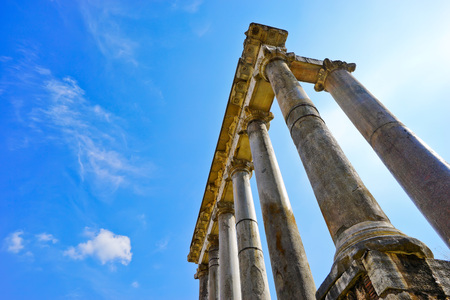 View of the columns of roman ruins in a sunny day in Rome, Italy.の写真素材