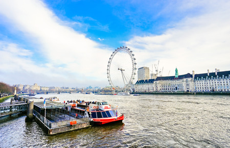 London, UK-February 5, 2017: View of the River Thames with London Eye in a sunny day in London on February 5, 2017.のeditorial素材