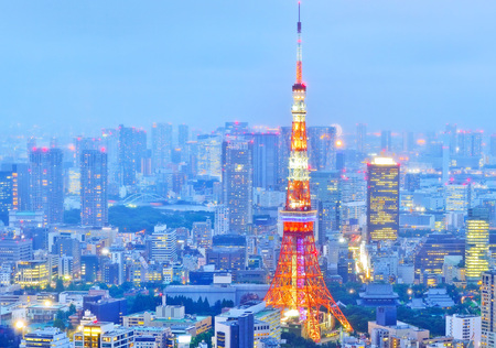 Tokyo, Japan - July 15, 2016: View of the skyline and Tokyo Tower at dusk in Tokyo, Japan on July 15, 2016.のeditorial素材