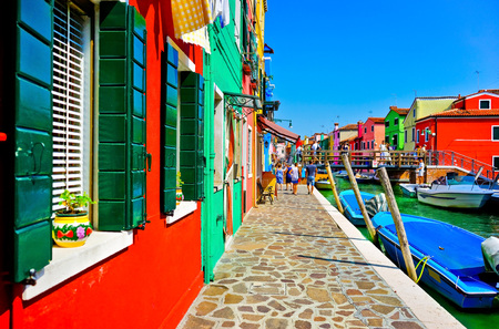View of the colorful Venetian houses along the canal at the Islands of Burano in Venice.の写真素材