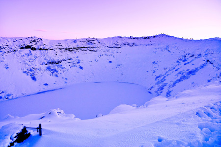 View of Kerid Crater at dusk in winter, where is on the popular route of Golden Circle in southwest Iceland.の写真素材