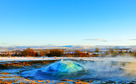 Eruption of Strokkur Geyser in winter, where is on the popular route of Golden Circle in southwest Iceland.の写真素材