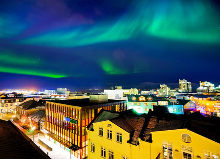 View of the northern light from the city center in Reykjavik, Iceland.の写真素材