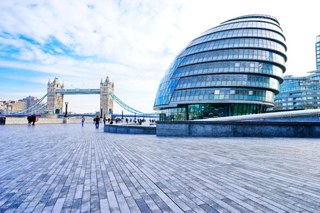London, UK- February 6, 2017: View of City Hall and Tower Bridge on the square next to River Thames in London on February 6, 2017.のeditorial素材