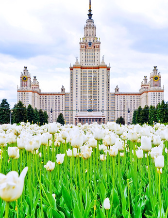 View of Moscow State University with lots of flowers in summer in Moscow.のeditorial素材