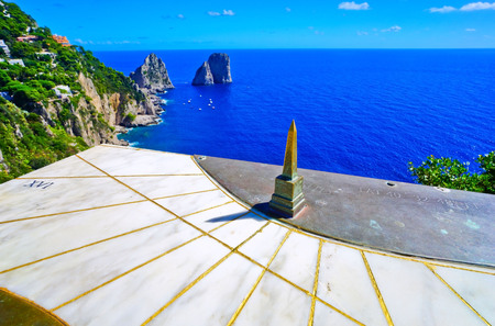 View of a sundial and beautiful coastline of the Capri Island in Italy in summer.のeditorial素材