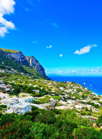Overlooking the beautiful coastline of the island from city center of Capri in Italy in summer.の写真素材