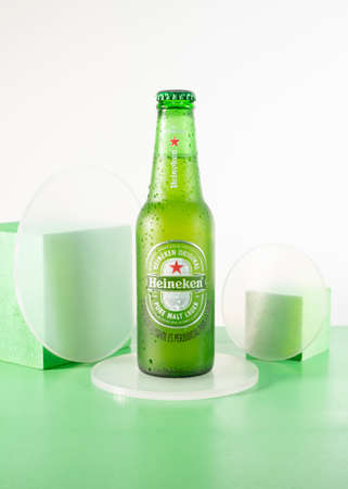 Bottle of Heineken Beer on green backgroundのeditorial素材