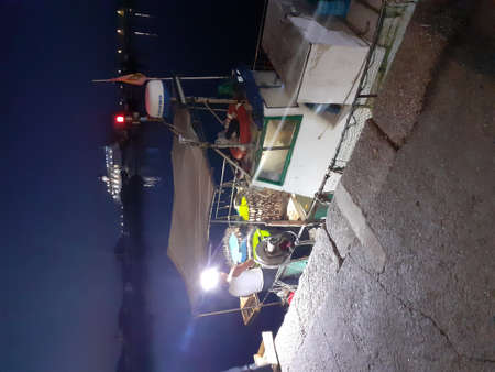 Hanging clothes in the street of Nha Trang, Vietnamの写真素材