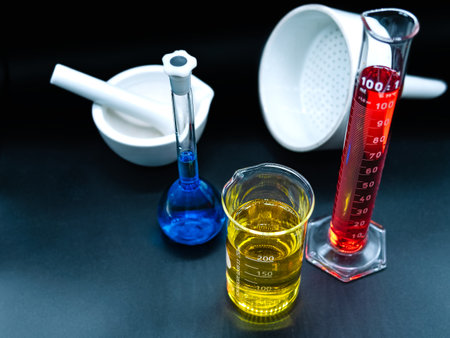 Glass chemistry on a black background. selective focusの写真素材