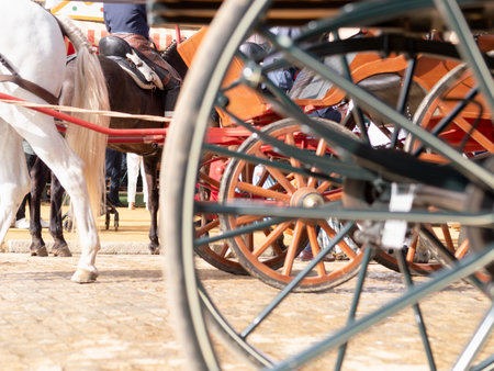 Traditional fair scene with carriage wheelの写真素材