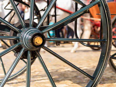 Traditional fair scene with carriage wheelの写真素材