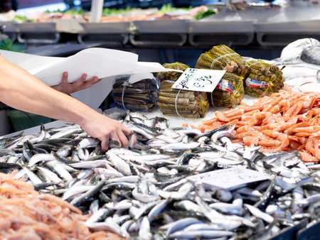 Fresh seafood display at a fish market.の写真素材